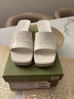 Gucci White Embossed Logo Slide Mules